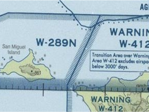 A VFR sectional chart showing warning areas W-289N and W-412 off the California coast near San Miguel Island, depicted with blue hatched boundaries. The chart includes a note indicating a transition area over W-412 that excludes airspace below 3,000 feet during the day.