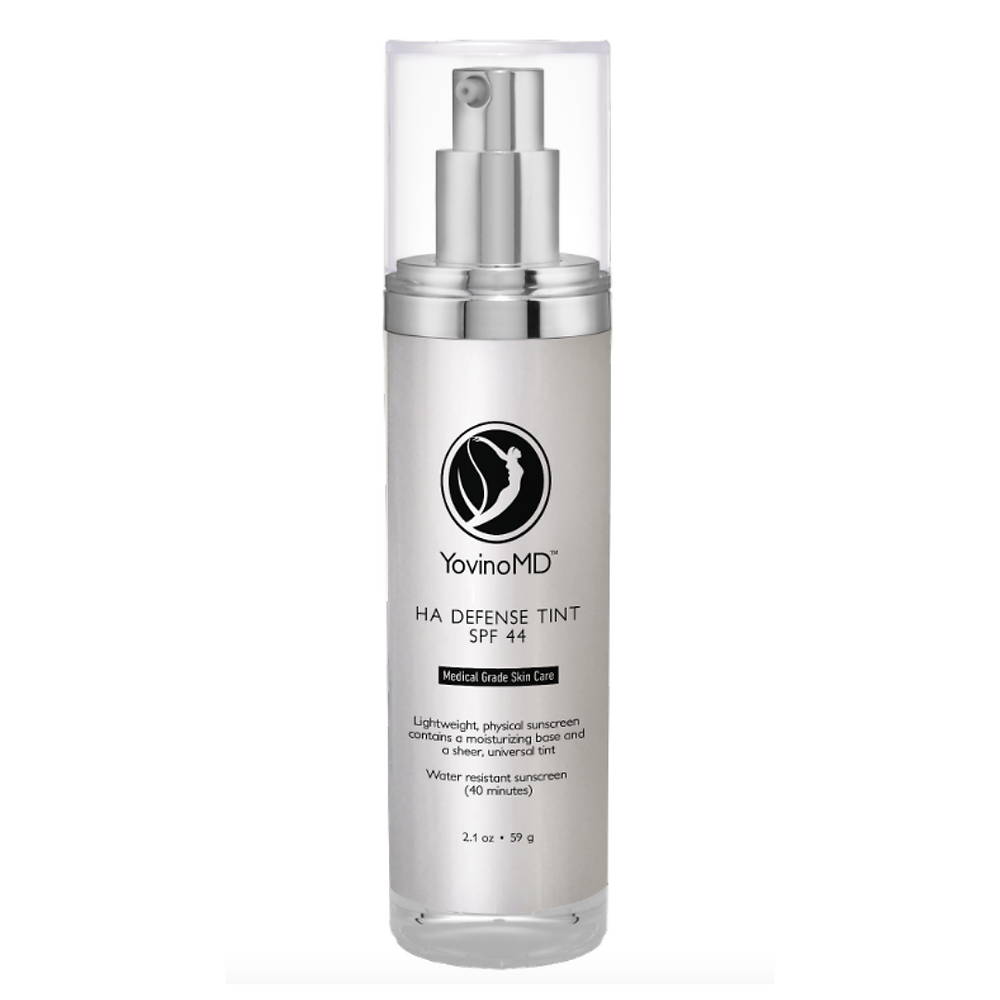Image of YovinoMD HA Defense Tint SPF 44. It is a sleek silver, air-pump container.
