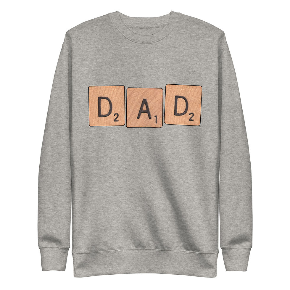 Thumbnail: The word DAD is spelled out slightly unevenly in large Scrabble-type squares on a light grey crewneck sweatshirt.