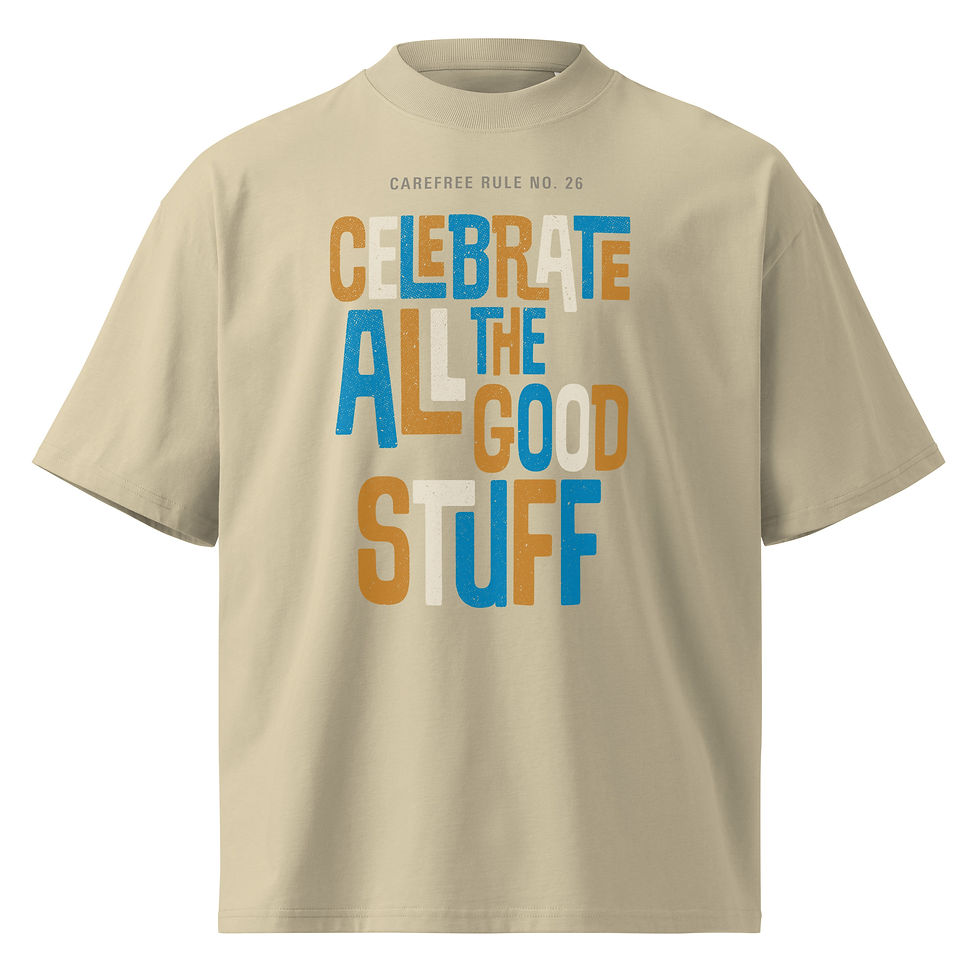 Thumbnail: Oversized stone-colored T-shirt with “Celebrate All the Good Stuff” text graphic