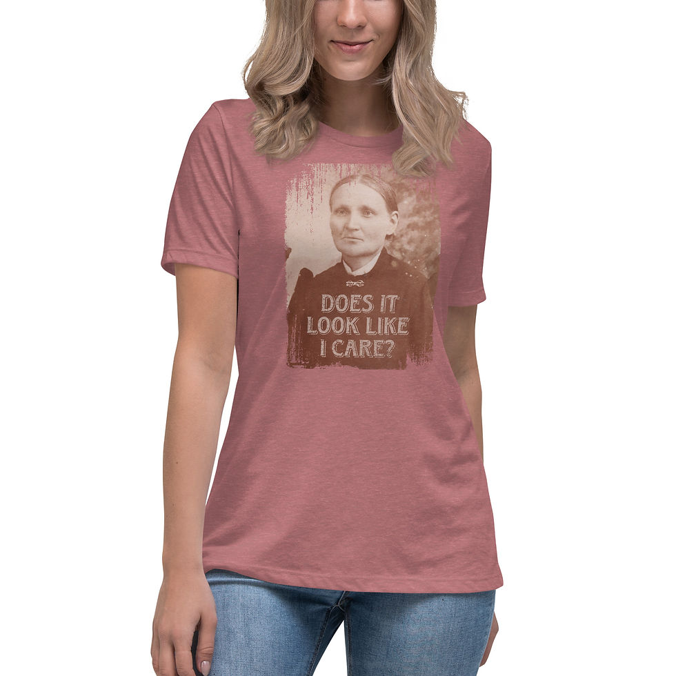 Thumbnail: Vintage-look mauve t-shirt featuring a distressed photo of a disinterested woman and text: 'Does It Look Like I Care?