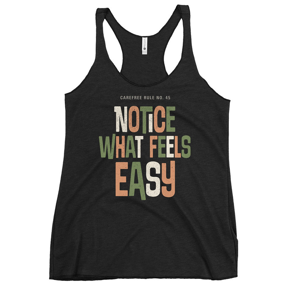 Black racerback tank top with “Notice What Feels Easy” text graphic