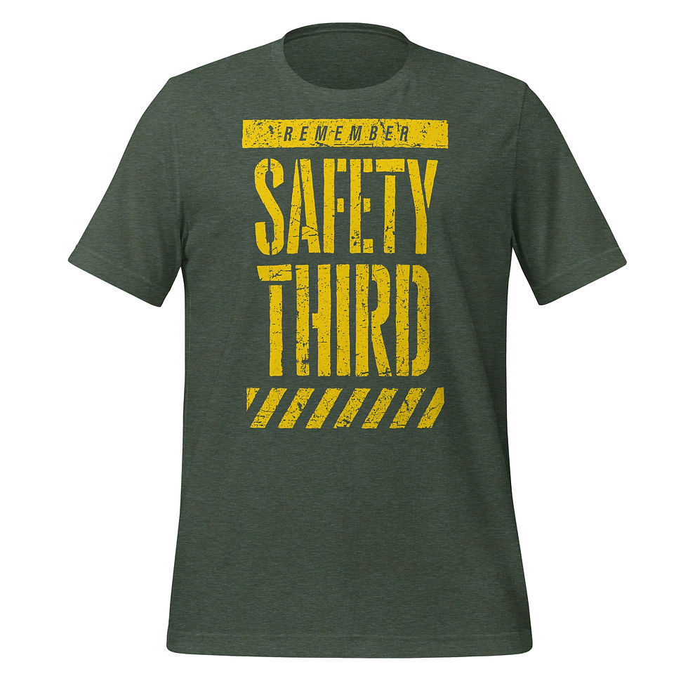 Thumbnail: Heather forest t-shirt with bold yellow distressed text that reads “Remember: Safety Third” in a warning-sign style layout.
