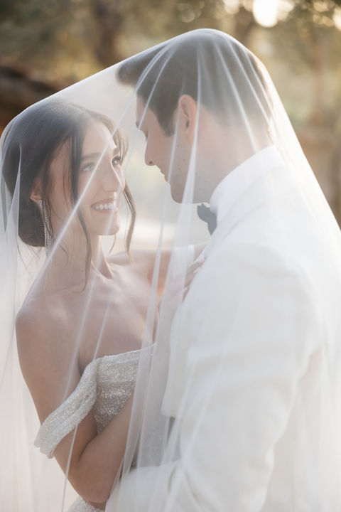 Bride and groom on the wedding in Greece. Photographer based in Crete, Creece. Agreco Farm - location for weddings celebrations. Alex Dobrovolsky, a photographer from Italy.