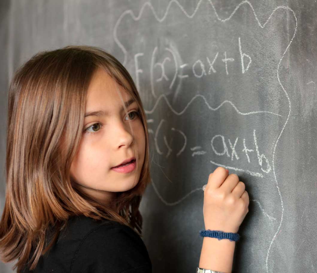 Student doing algebra at the board at Tutorific