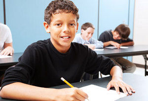 2 Boy in Class Writing.jpeg