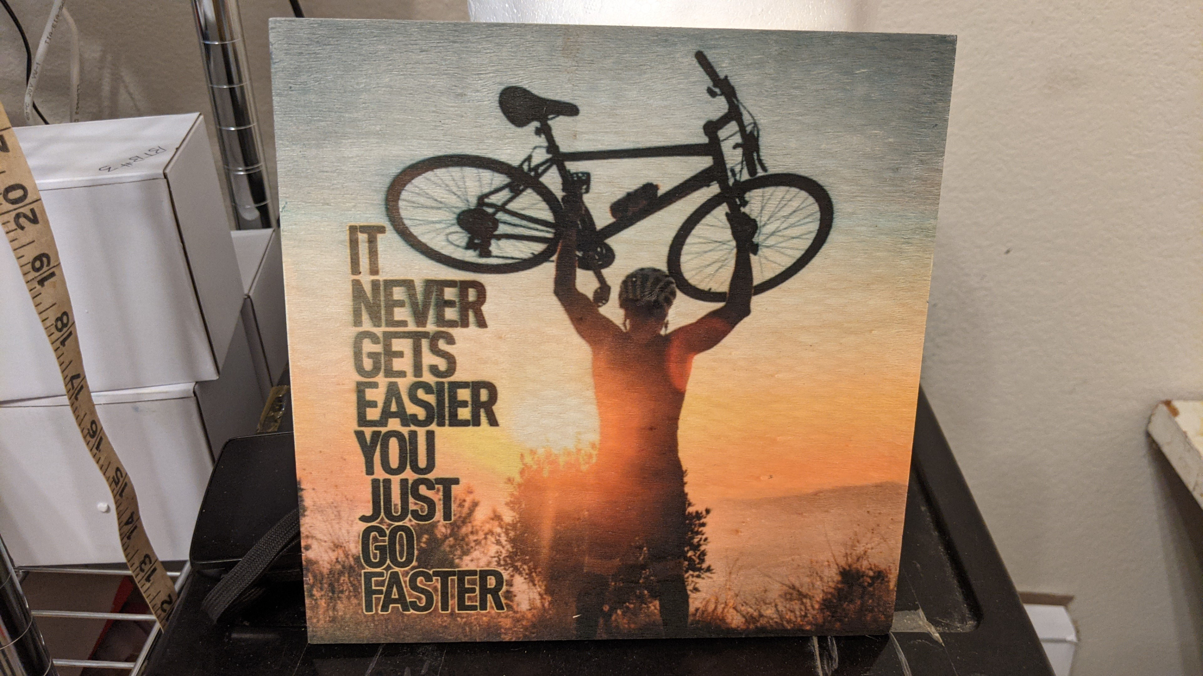 Cycling Never Gets Easier 8"X8" wood canvas Print