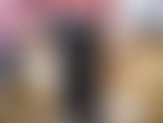 Couple taking a Golden Retriever on a snowy Winter walk