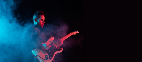 musician-isolated-dark-studio-neon-light.jpeg
