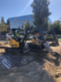 Mini Excavators digging