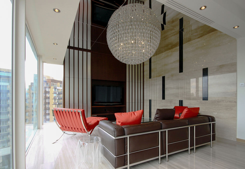 Luxury double-height living room at The Avignon Tuen Mun, with a grand crystal chandelier