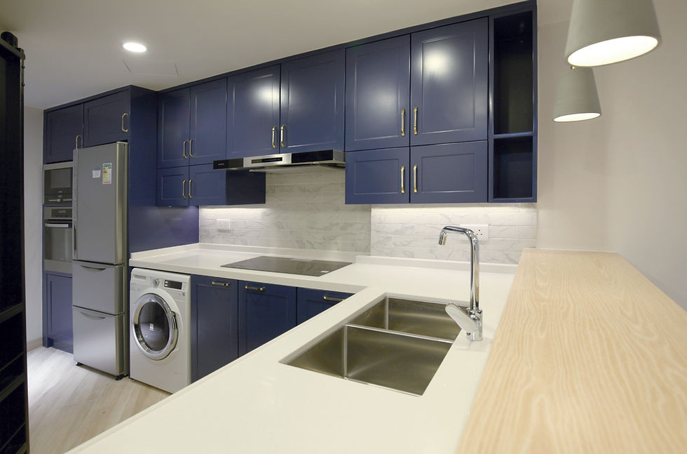 Modern blue kitchen design at Emerald Green Yuen Long by enochliving, with custom cabinets.