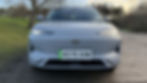 Static front-end shot of a gray Geely EX5 Max