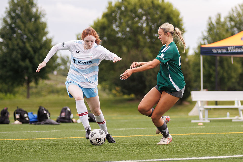 Katharine Stephens goes one-on-one with a DeKalb County United player. Credit: Nicholas Balabanoff
