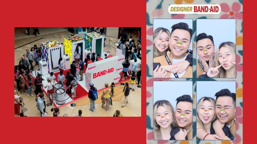 a group of people standing in front of a band aid booth