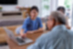 Healthcare worker using digital care software on tablet – Digital Care Solutions in 2025 for homecare agencies