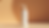 Eye-level view of a bottle of a moisturizer designed for tanned skin