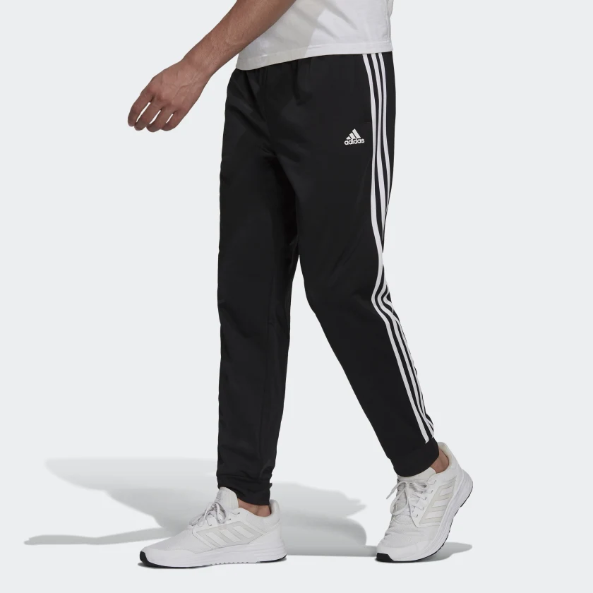 ADIDAS ESSENTIALS WARM-UP TAPERED 3-STRIPES TRACKSUIT BOTTOMS (H46105)