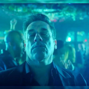 Jon Hamm shimmying in the club, lost in the moment