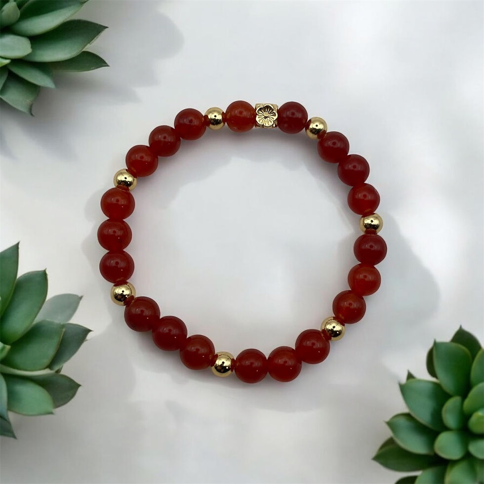 Orange glass beads with gold spacers bracelet
