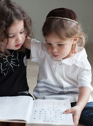 Children Studying Alphabet