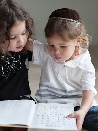 Children Studying Alphabet