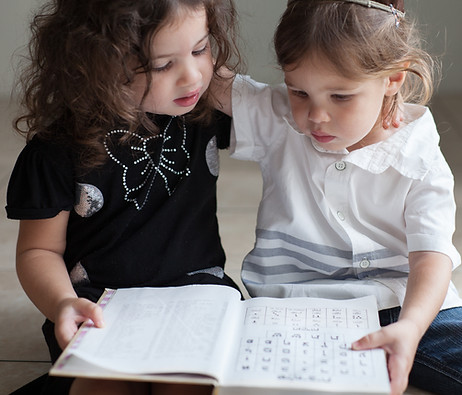 Children Studying Alphabet