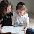 Children Studying Alphabet