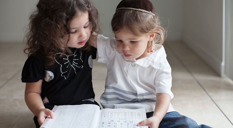Children Studying Alphabet
