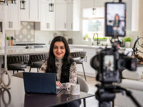 A woman poses on camera for social media content creation and video production in Seattle, WA