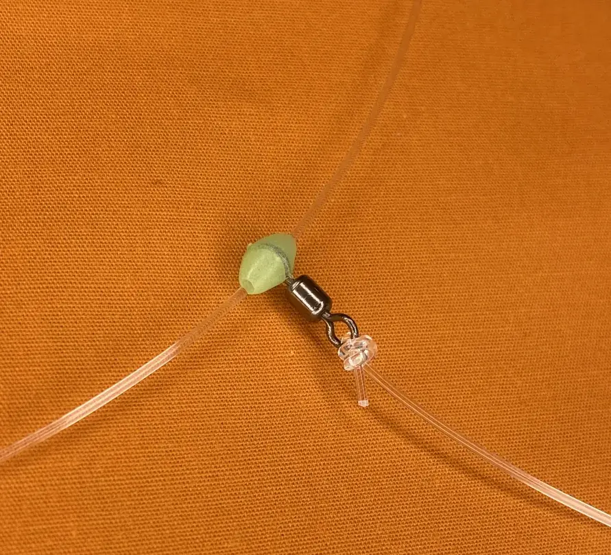 Miniatura: Sliding bead swivel.