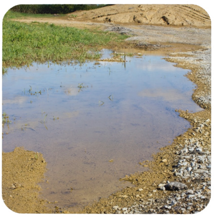 Dirt and Puddle at Construction Site