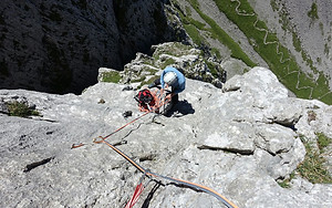 PRS Prime Re Solutions Credentials Models. An actuary is climbing a rock.