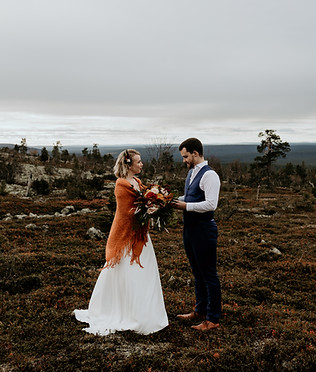 A couple eloping in Finland in autumn
