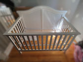 assemble a crib with changer