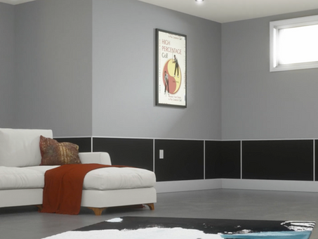 Finished basement room with EnduraFlood wall panels painted in a two tone color scheme for a clean, modern look