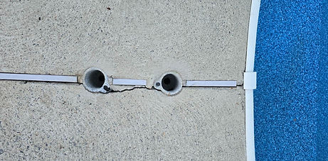 Cracking between anchor points along expansion joint