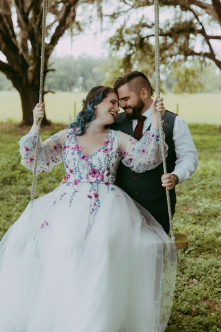 Bride and Groom on a swing