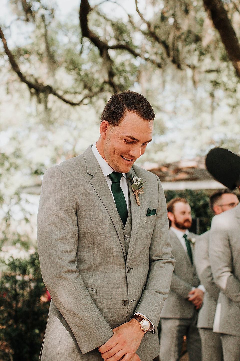 Groom standing at the alter