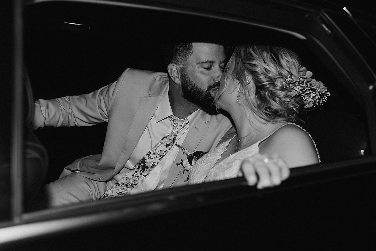 bride and groom getaway