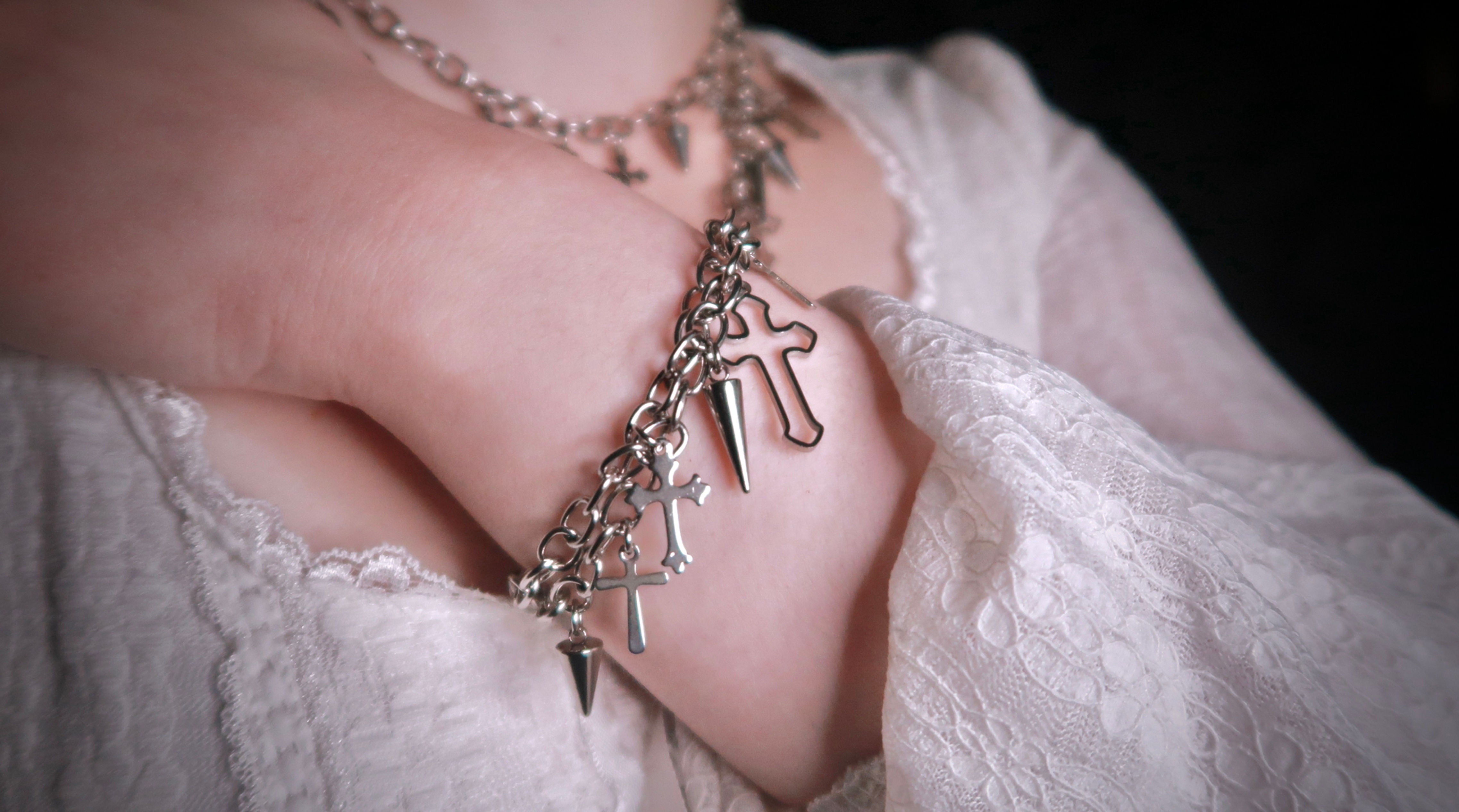 'Dreams Grow Darker' Cross Charm Bracelet