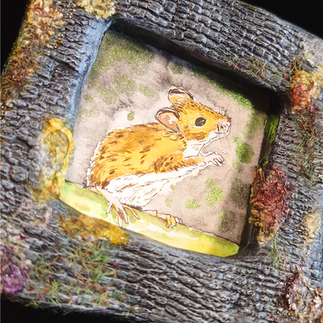 Image of a framed illustration of a mouse.