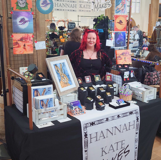 Hannah Kate stands behind her market stall.