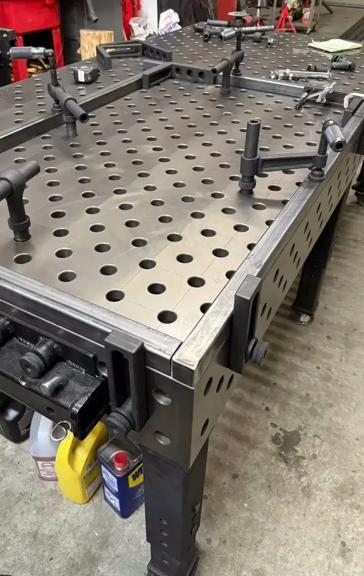 Industrial welding workbench with precision positioning system