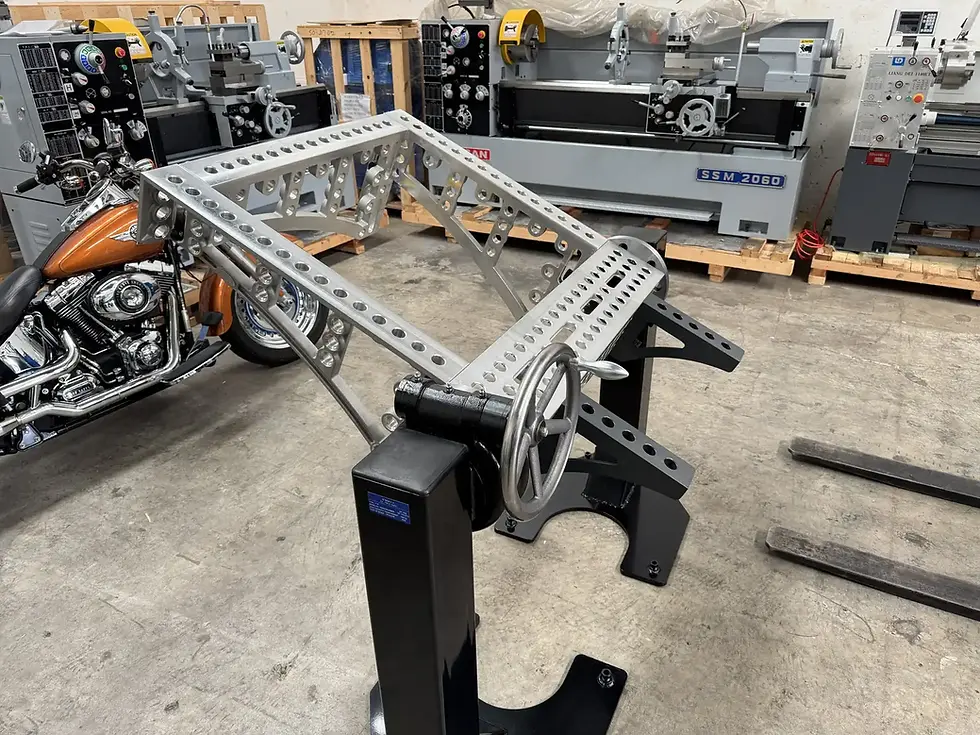 Large aluminium modular fixture frame mounted on M Positioner welding rotisserie