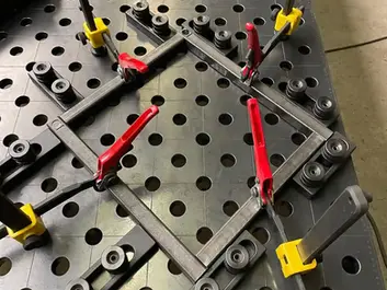 Modular welding table with 28mm hole grid for precision metal fabrication Canada
