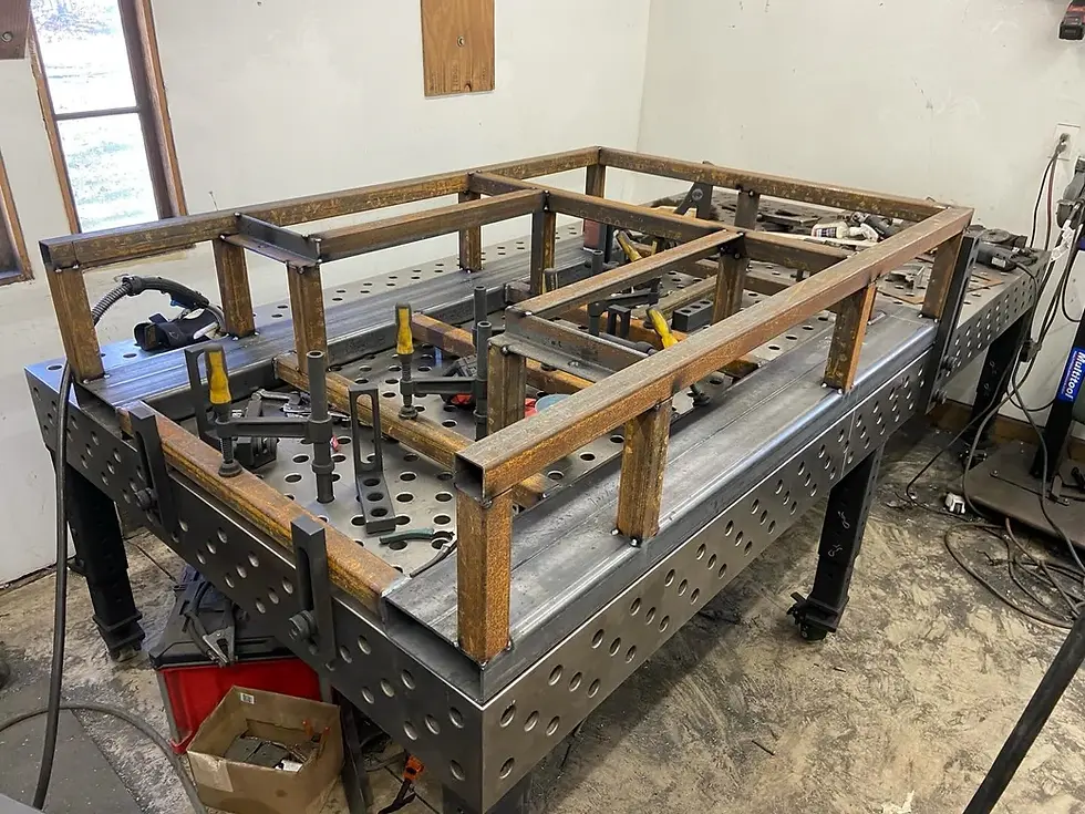 3D welding table supporting rectangular steel frame fabrication