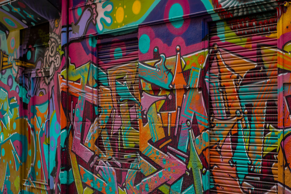 Digital color photograph of graffiti in Madrid, Spain