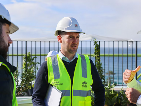 Building Commissioner wearing a hard hat
