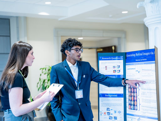 Student presenting at the fair
